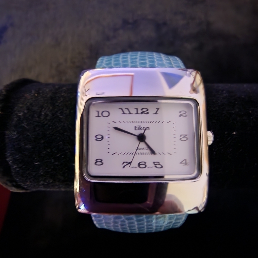 Silver Tone Watch with Blue Strap